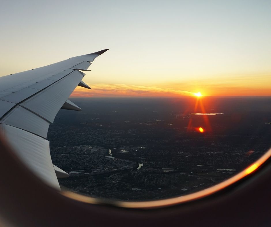 Sunset view out of a plane window